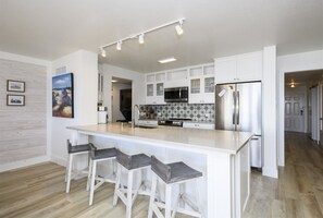 Condo, Multiple Beds, Patio (The Royal Reef - Pet Friendly) | Private kitchen | Fridge, microwave, dishwasher, coffee/tea maker - Laguna Reef 2 by Miss Kitty’s (Rockport)