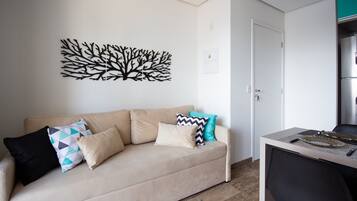 Estúdio | Área de estar | TV 40 polegadas com canais a cabo