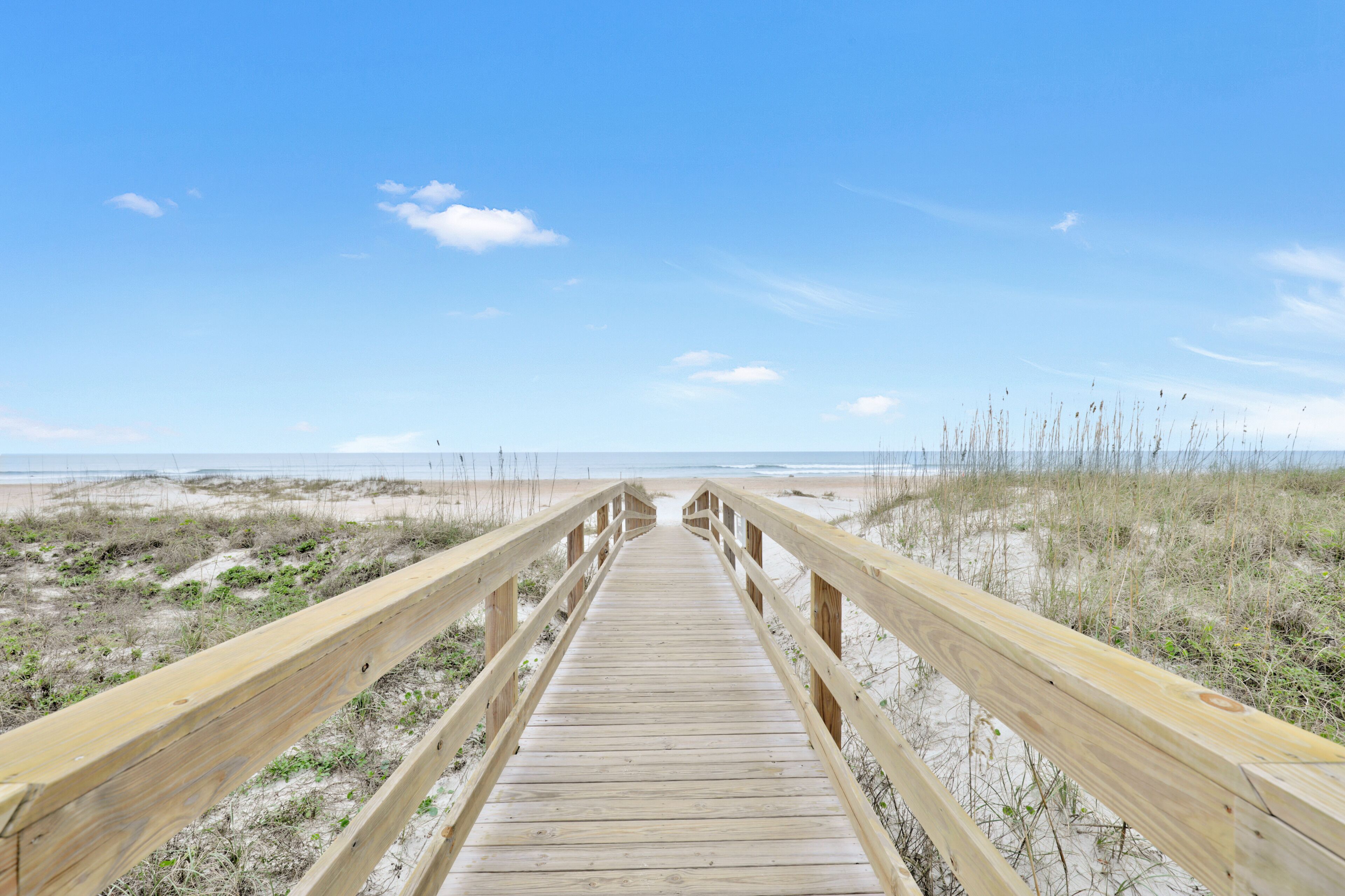 On the beach, sun loungers, beach towels