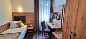 Habitación empresarial individual | Ropa de cama hipoalergénica y escritorio 