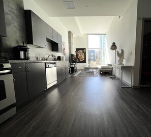 Fridge, microwave, stovetop, coffee/tea maker