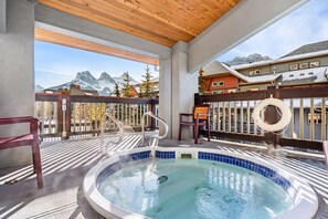 Outdoor pool, a heated pool - Heated outdoor Pool & Tubs 2 Bedroom & 2 Full baths 5 beds 9 Guests (Canmore)