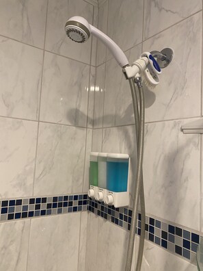 Shower, hair dryer, towels, soap