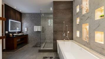 Bathtub, towels, soap, shampoo