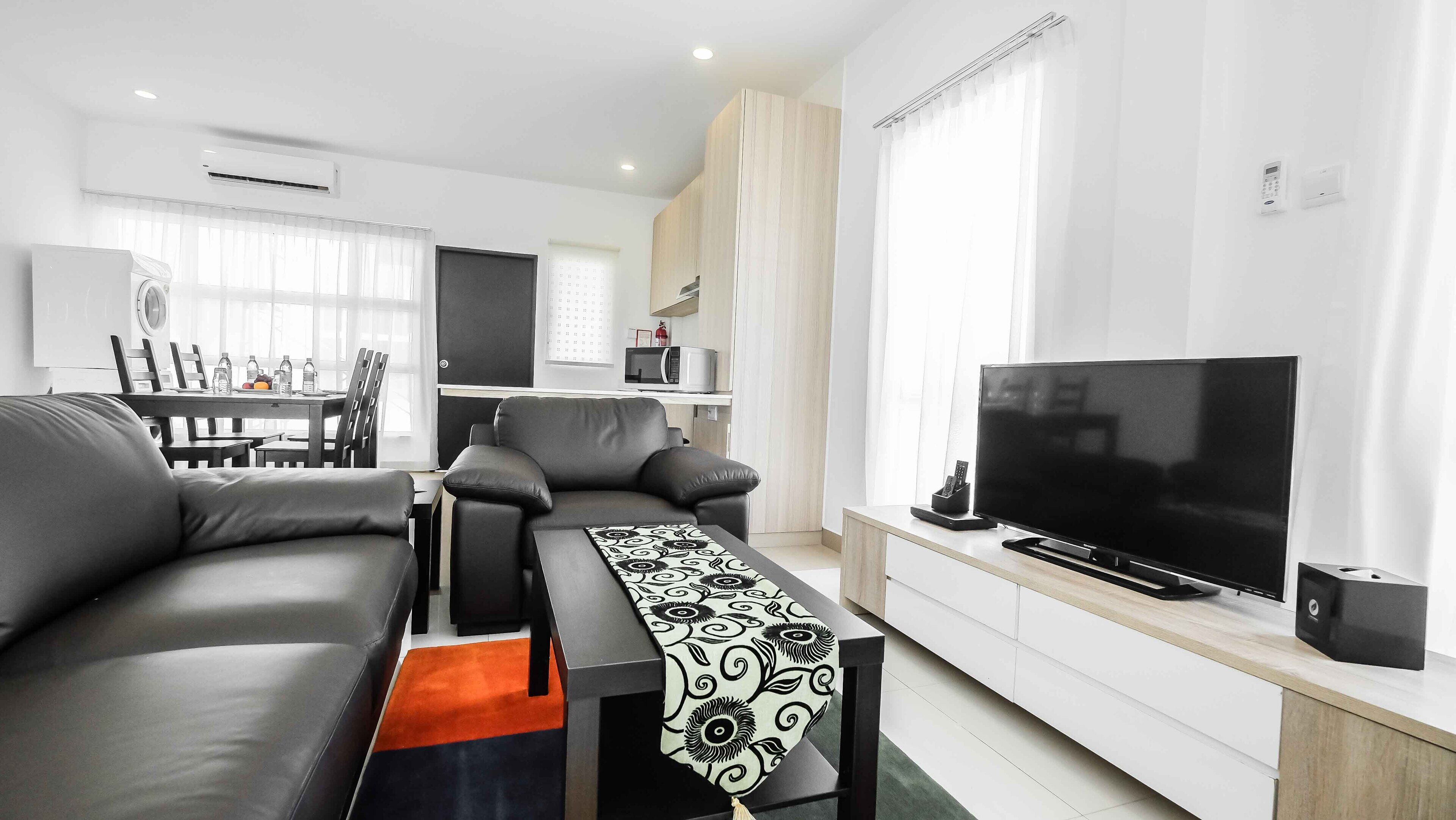 40-inch flat-screen TV with satellite channels, TV