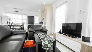 40-inch flat-screen TV with satellite channels, TV