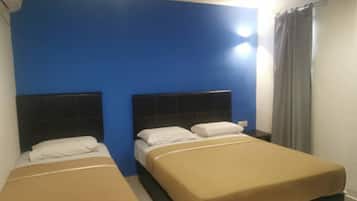 Economy Triple Room | Desk, blackout drapes, soundproofing, iron/ironing board