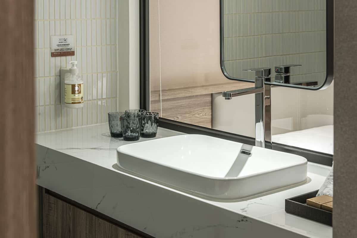 Superior Quadruple Room | Bathroom | Hair dryer, slippers, electronic bidet, towels