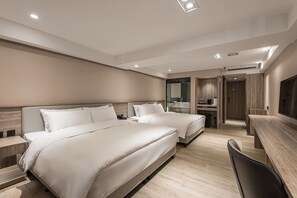 Superior Quadruple Room | Down comforters, free minibar, blackout drapes, iron/ironing board - Spring's Rhapsody Hotel (Taichung)