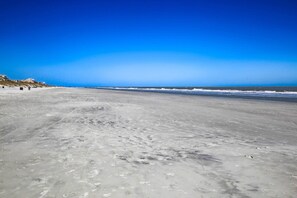 Enjoy a serene beach experience with access to the ocean.
