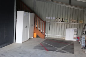 Functional space with a staircase and storage unit, perfect for utility or storage needs.