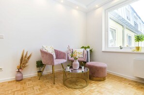 Deluxe Condo | Living area | Smart TV