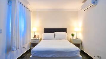 Desk, laptop workspace, free WiFi, bed sheets