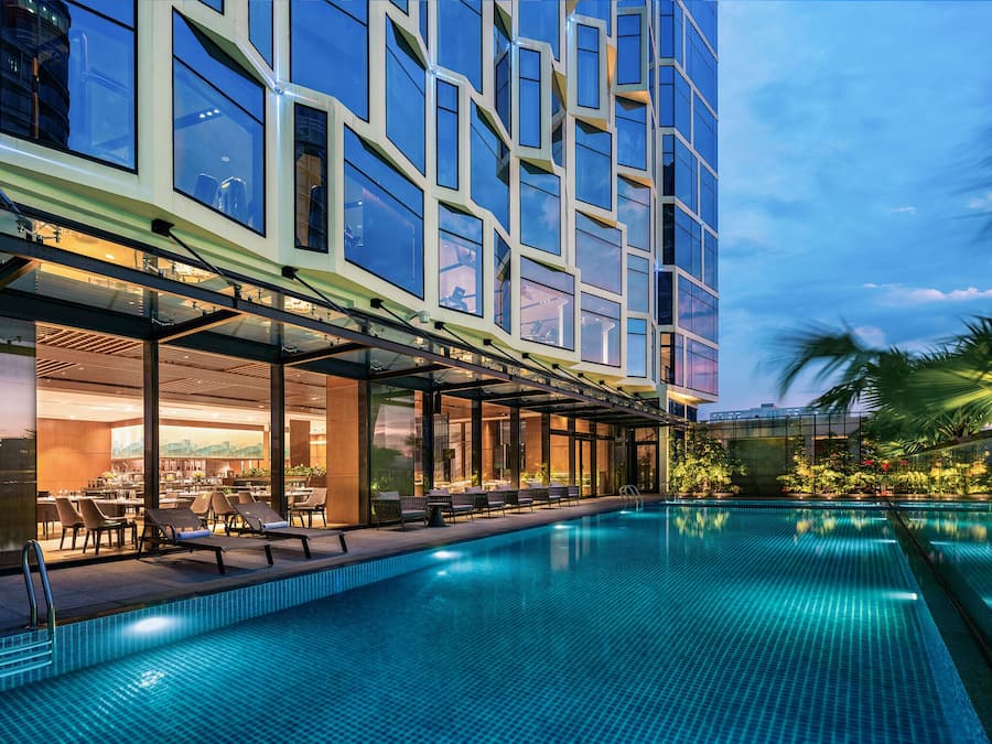 Outdoor pool, open 6:00 AM to 8:00 PM, pool loungers