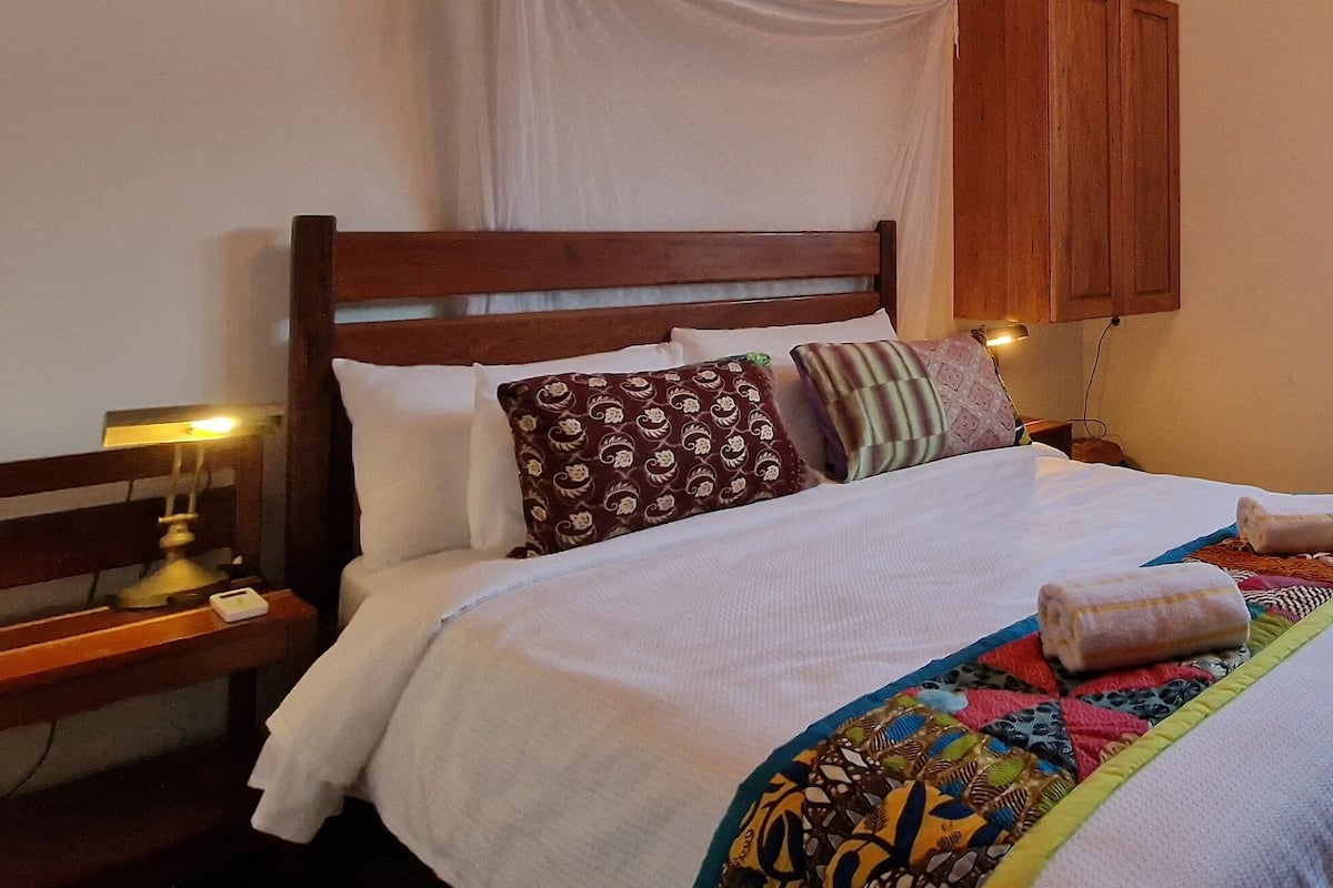 Economy Room | In-room safe, desk, blackout drapes, iron/ironing board (on request)