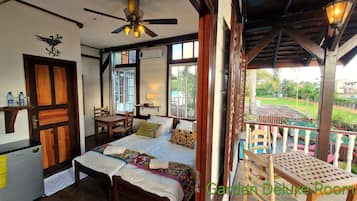 Deluxe Garden Rooms | Una cassaforte in camera, una scrivania, tende oscuranti