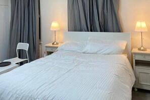 مكواة/لوح كي وواي فاي مجانًا وملاءات أسرّة