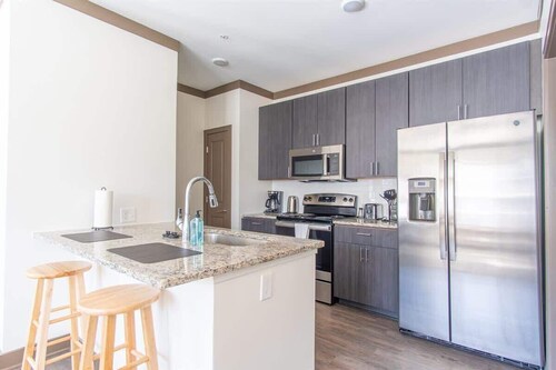 Boulevard Stays Expansive 1BR Suite, Parking