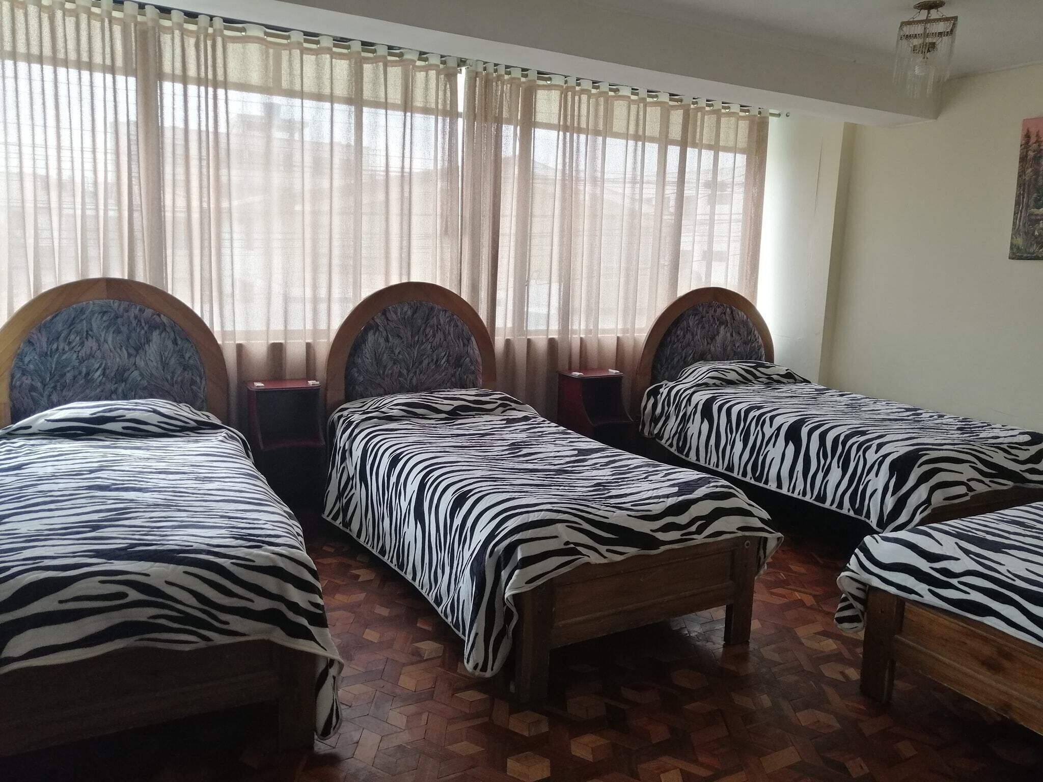 Economy Quadruple Room | Individually decorated, individually furnished, free WiFi, bed sheets