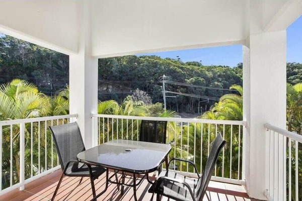 Outdoor patio which overlooks pool