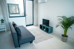 Superior Studio | Living area | 42-inch flat-screen TV with cable channels, TV