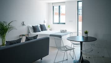 Superior Studio | Living area | 42-inch flat-screen TV with cable channels, TV