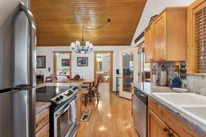 House, Multiple Beds, Balcony, Garden View (Grey Moose Lodge) | Private kitchen | Coffee/tea maker, dining tables