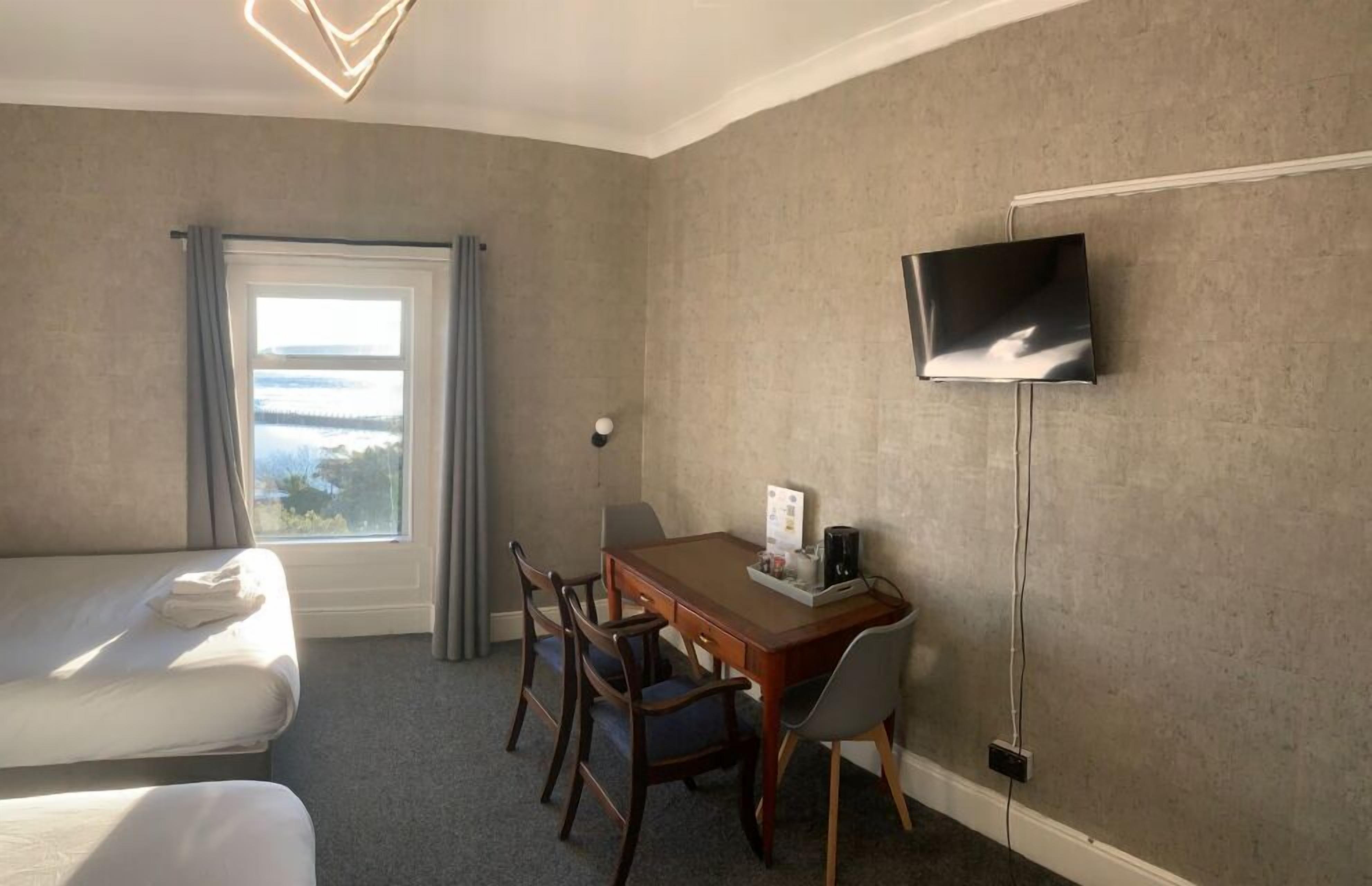 Standard Quadruple Room, Private Bathroom | Free WiFi, bed sheets