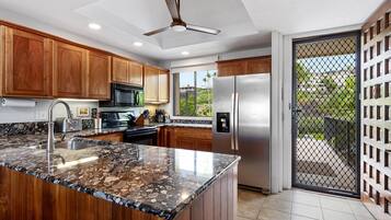 Condo, Multiple Beds, Lanai, Ocean View | Private kitchen | Fridge, microwave, oven, stovetop