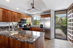 Condo, Multiple Beds, Lanai, Ocean View | Private kitchen | Fridge, microwave, oven, stovetop