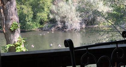 Charming 2bed/2bath home with covered deck right on the beautiful Rogue River