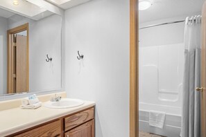 Shower, towels, soap, toilet paper