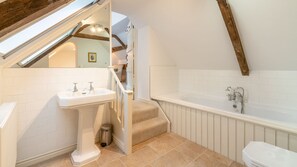 Bathtub, hair dryer, towels