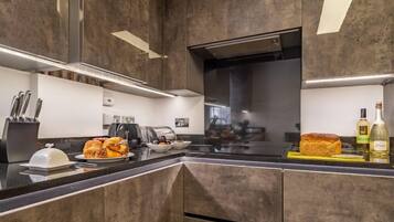 Fridge, microwave, dishwasher, coffee/tea maker