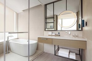 Suite, 1 King Bed, Ocean View | Bathroom | Free toiletries, hair dryer, slippers, towels