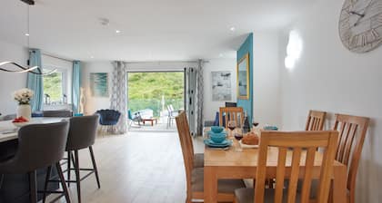 Anneth Lowen is a large four-bedroom detached house, just a short stroll from the bustling beaches o