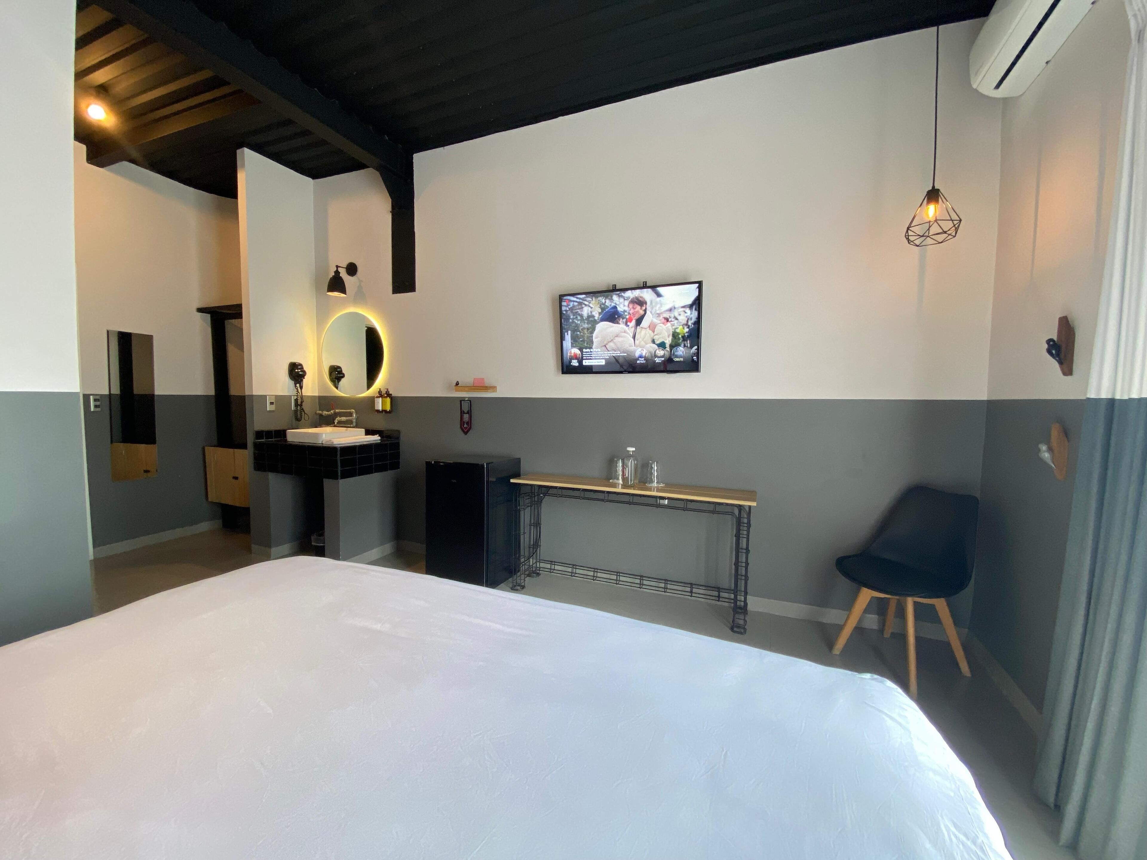 Habitación Premium | Ropa de cama de alta calidad y edredones de plumas