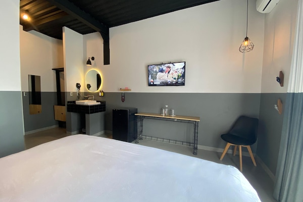 Habitación Premium | Ropa de cama de alta calidad, edredón y camas con pillow-top