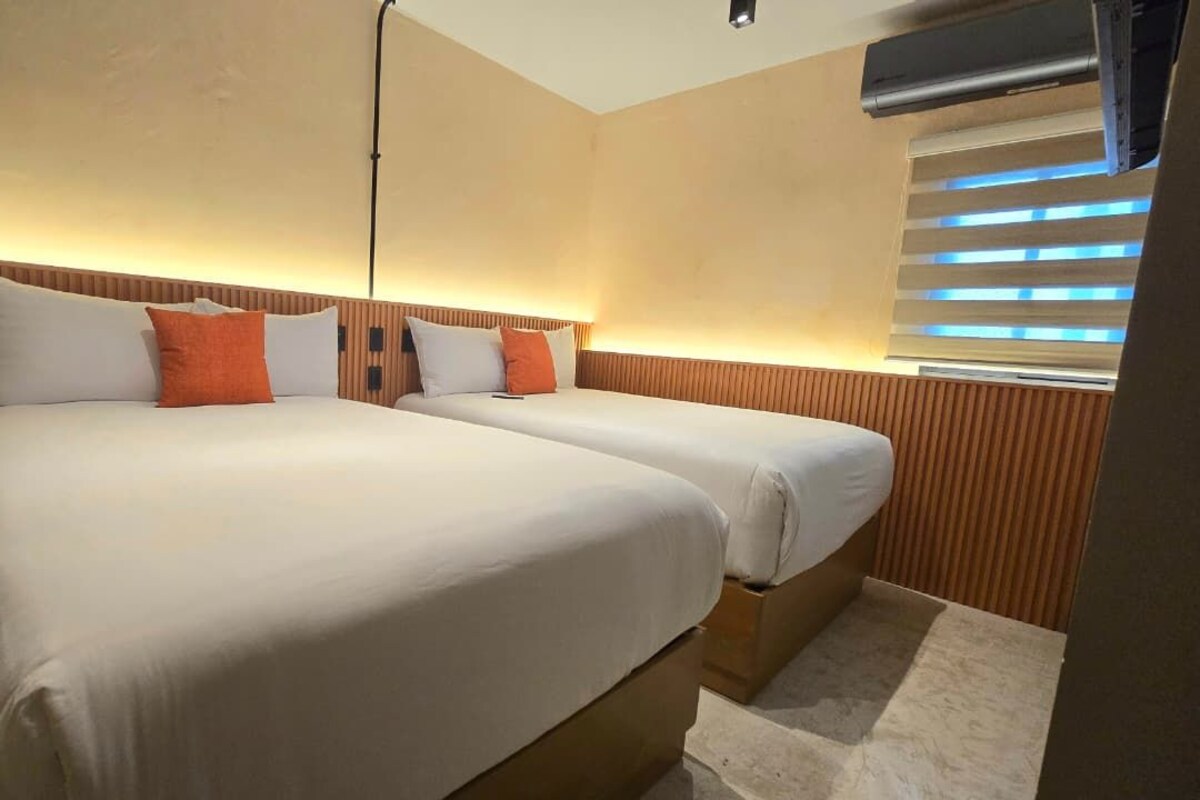 Standard Quadruple Room, City View | Premium bedding, down comforters, pillowtop beds, desk