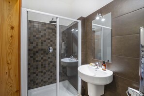 Bathtub, hair dryer, towels