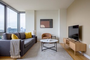 TV, stereo - Amazing LIC 1BR w/ Doorman, Pool & Gym, nr River, by Blueground (New York)