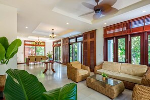Standard Villa | Living area | 40-inch flat-screen TV with digital channels, TV - Luxury Danang Beach Pool Villa (Da Nang)