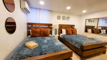 3 habitaciones, tabla de planchar con plancha, wifi y ropa de cama