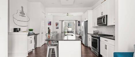 Fridge, microwave, dishwasher, coffee/tea maker