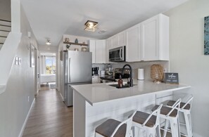 Fridge, microwave, oven, stovetop - Steps from the beach- newly remodeled townhome in the quiet section of Nav Beach (Navarre)