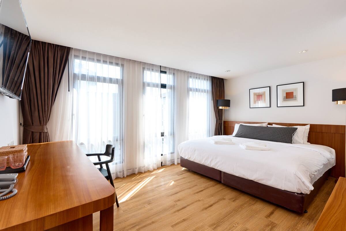 Studio Deluxe | Minibar, truy cập Internet không dây miễn phí, bộ trải giường 