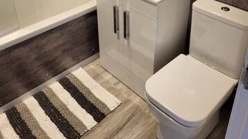 Combined shower/bathtub