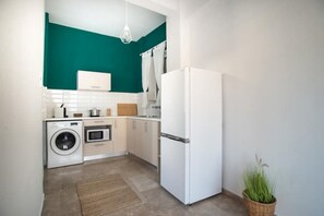 Fridge, microwave, stovetop, coffee/tea maker