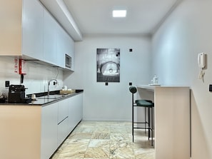 Fridge, microwave, coffee/tea maker, electric kettle