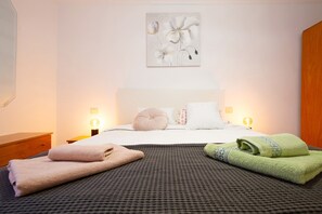 2 habitaciones, tabla de planchar con plancha y wifi gratis